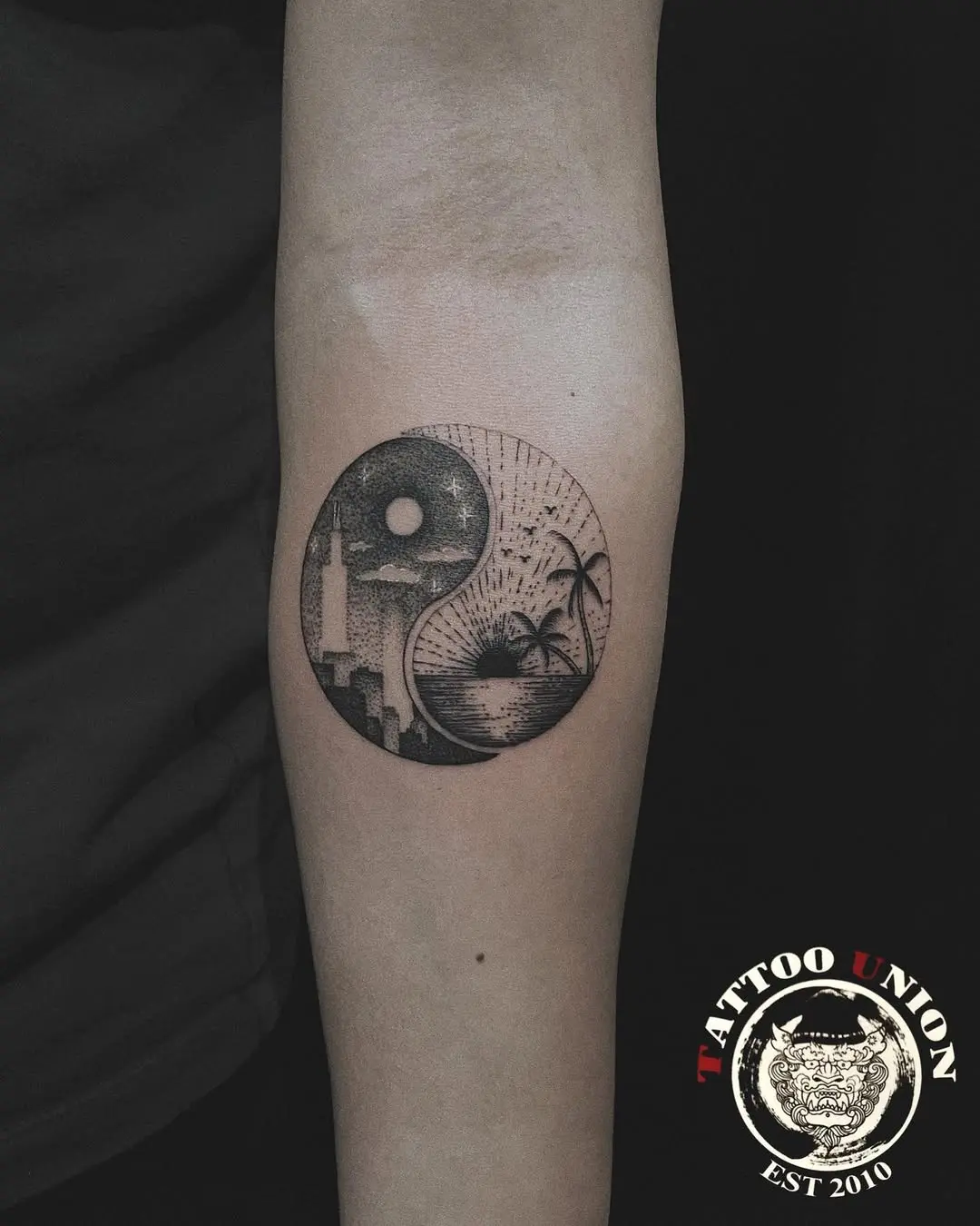 Intricate yin yang tattoo with nature elements