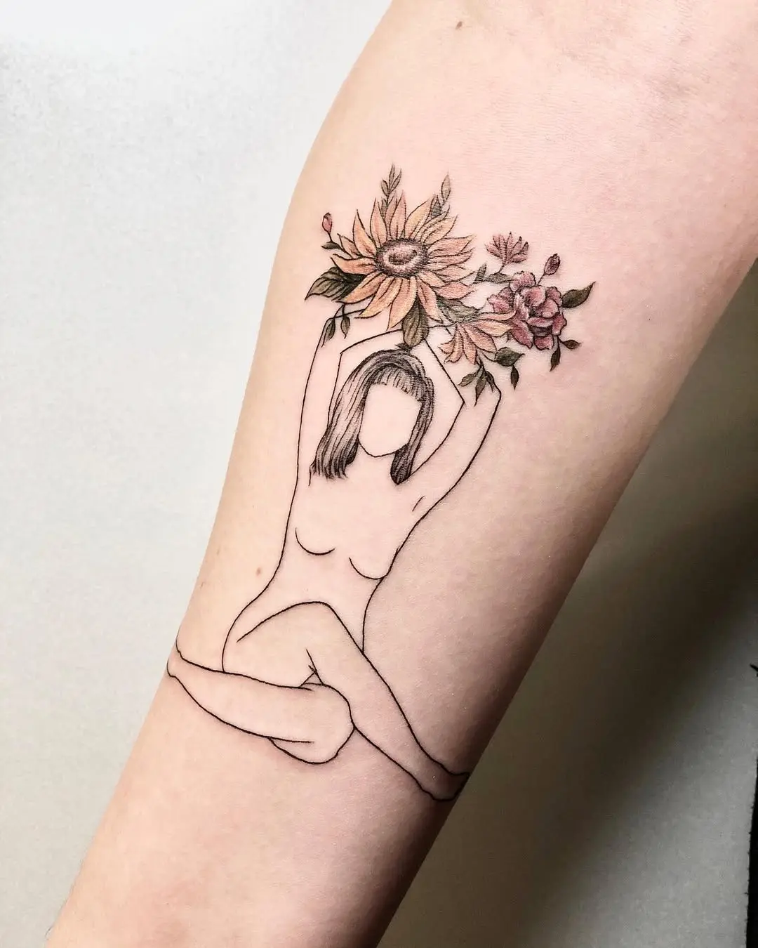 Elegant yoga silhouette adorned with colorful flowers
