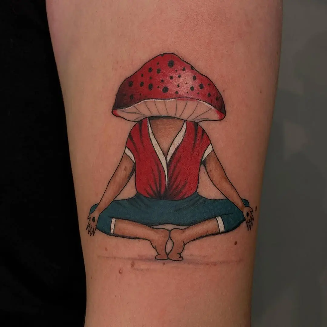 Unique mushroom-themed yoga tattoo inspiration