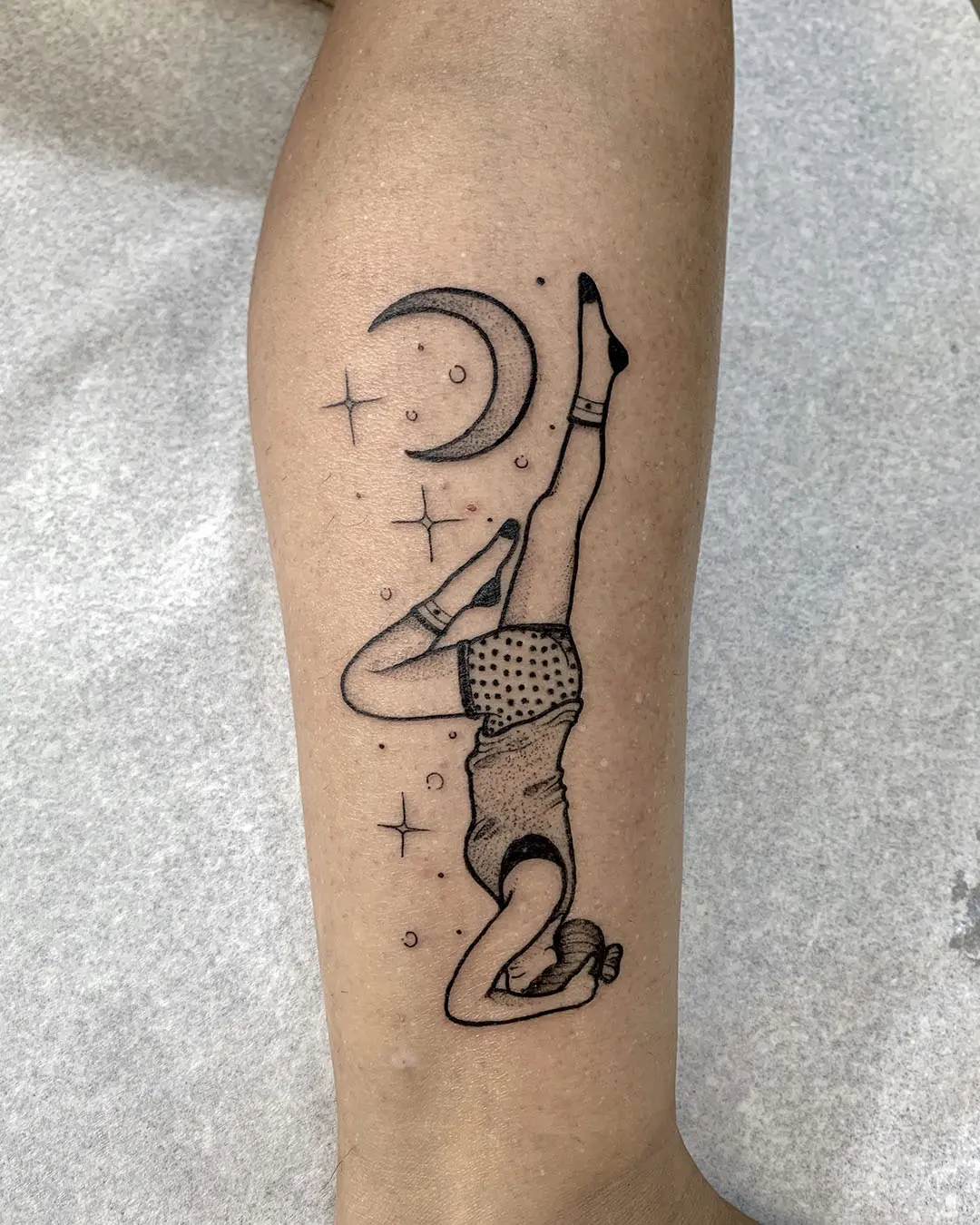 Yoga pose tattoo under a crescent moon