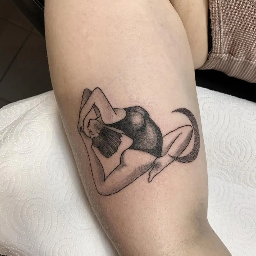 Artistic representation of a yoga pose tattoo
