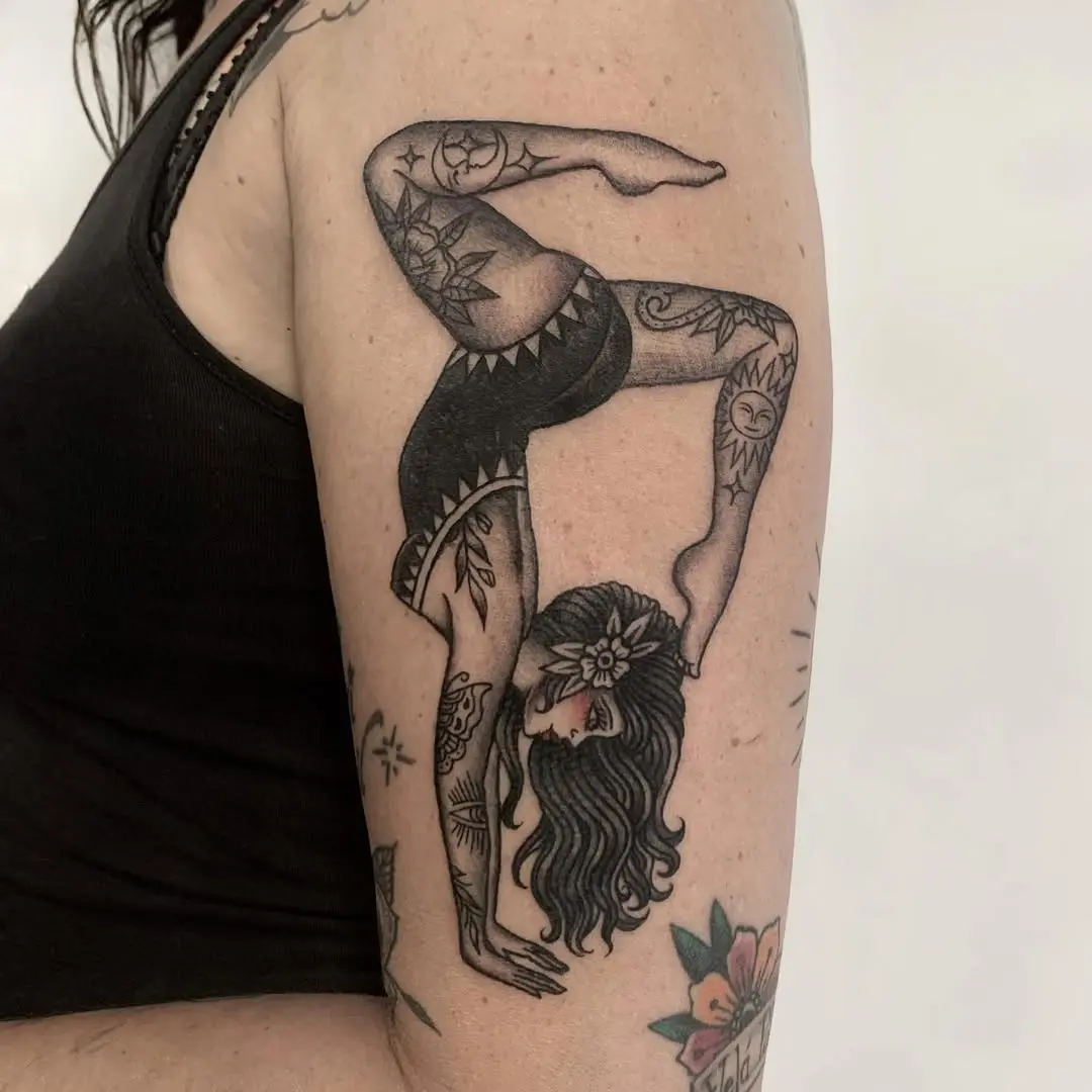 Elegant yoga pose tattoo for body art lovers