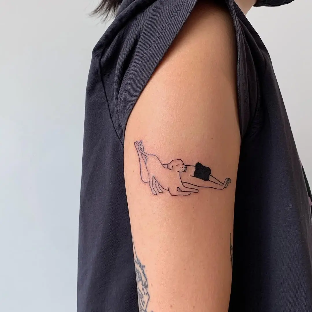 Playful dog in yoga pose tattoo