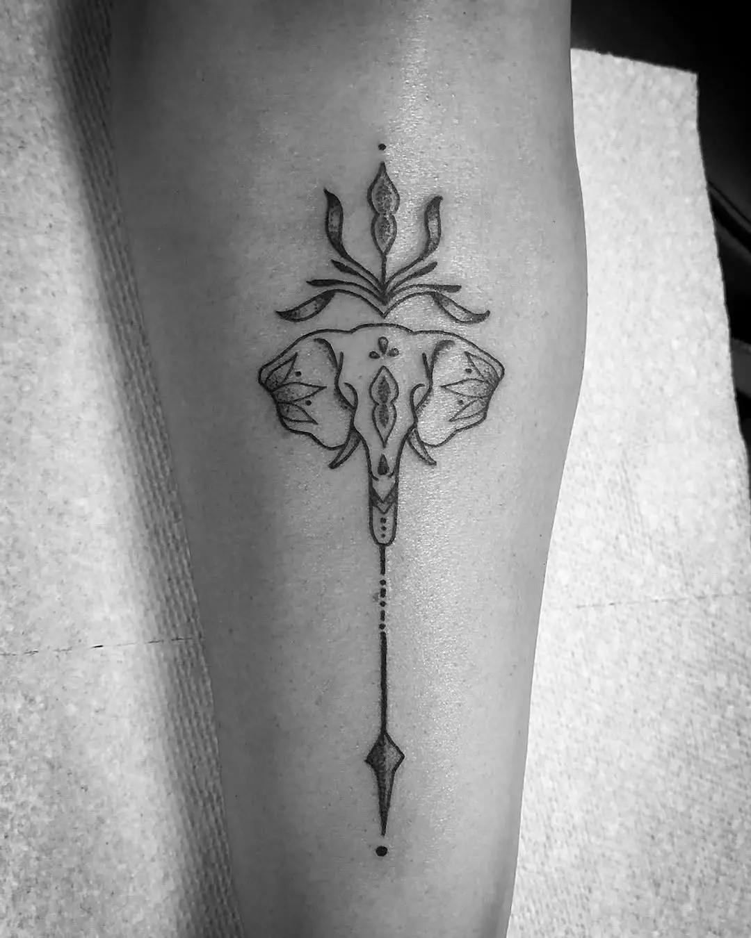 Elegant elephant tattoo representing strength and wisdom