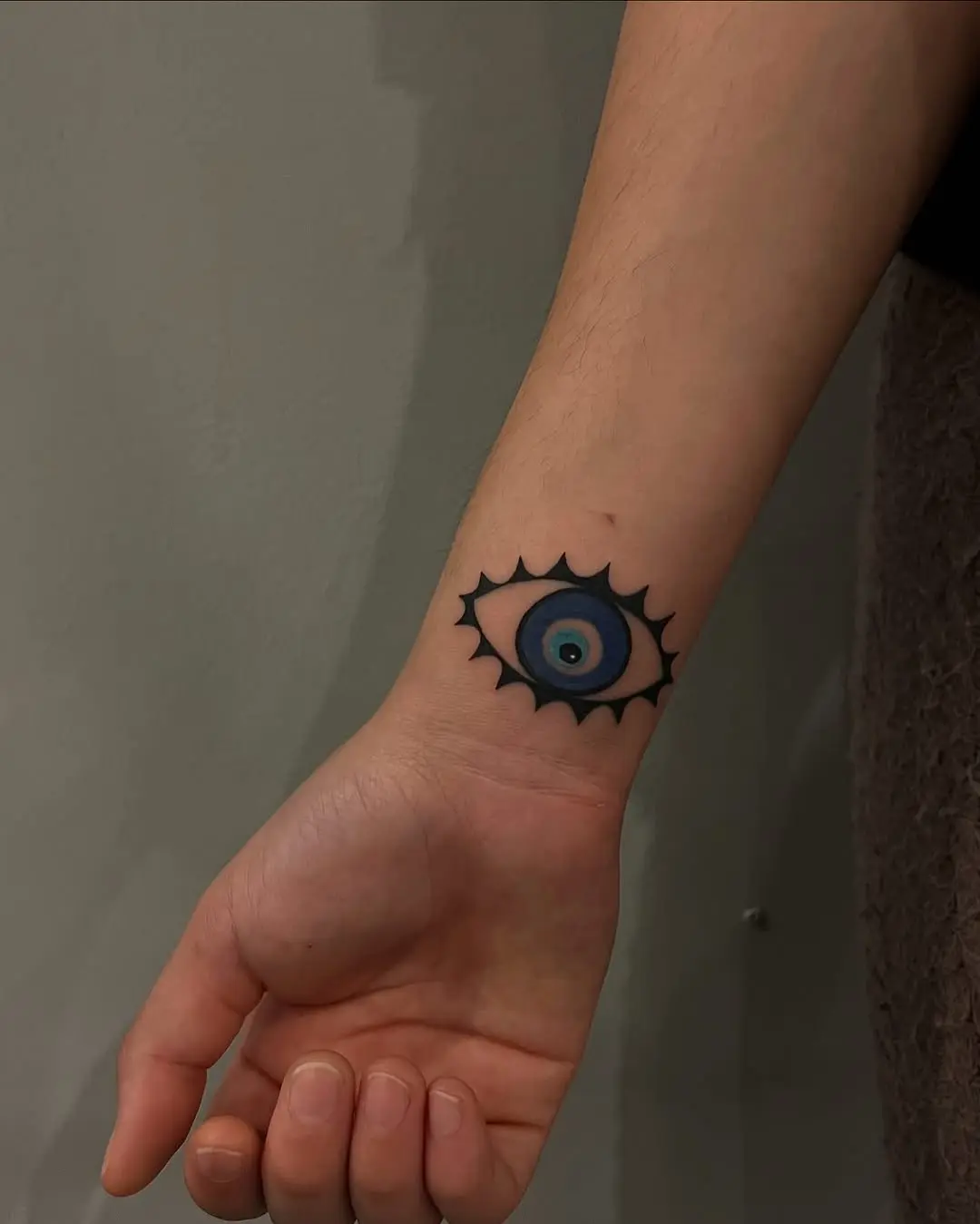Intricate eye tattoo symbolizing insight and focus