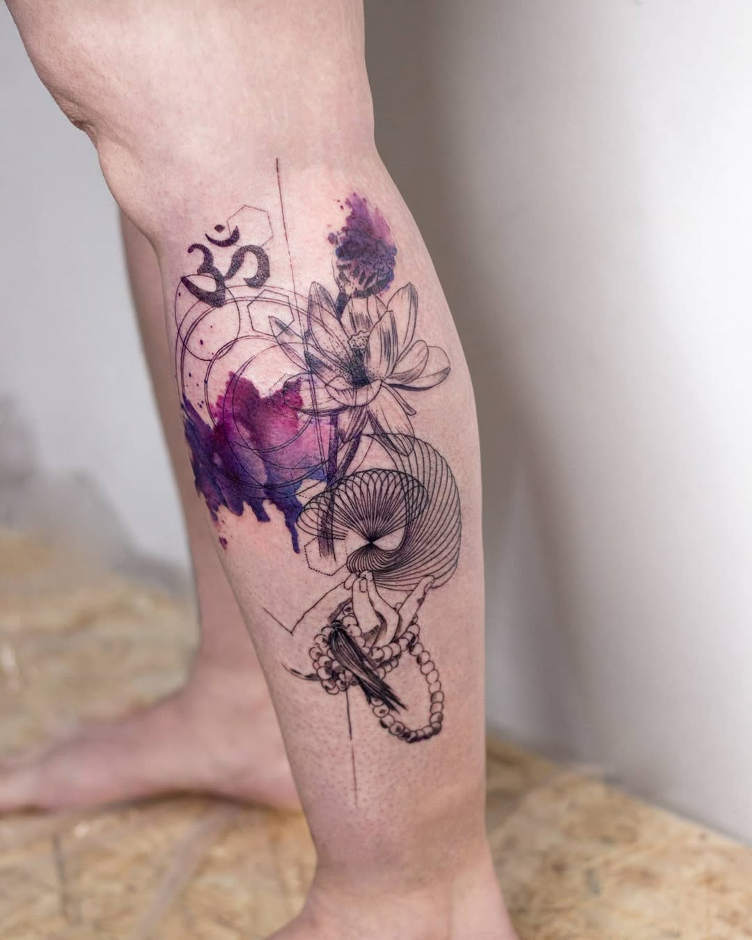 Intricate yoga-inspired tattoo on leg design