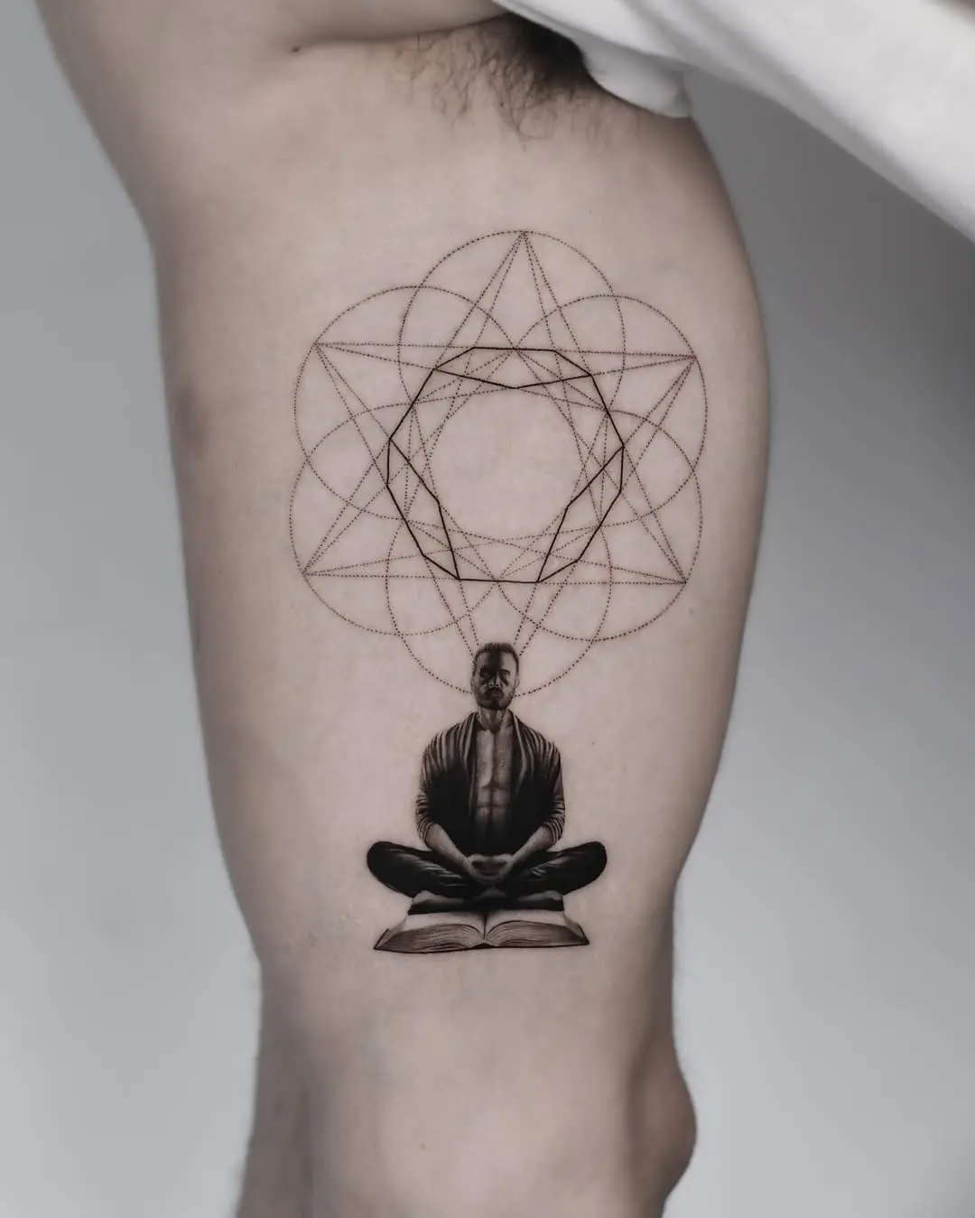 Meditative geometric design tattoo inspiration