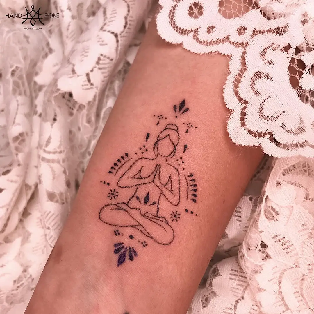 Intricate meditation pose tattoo for peace seekers