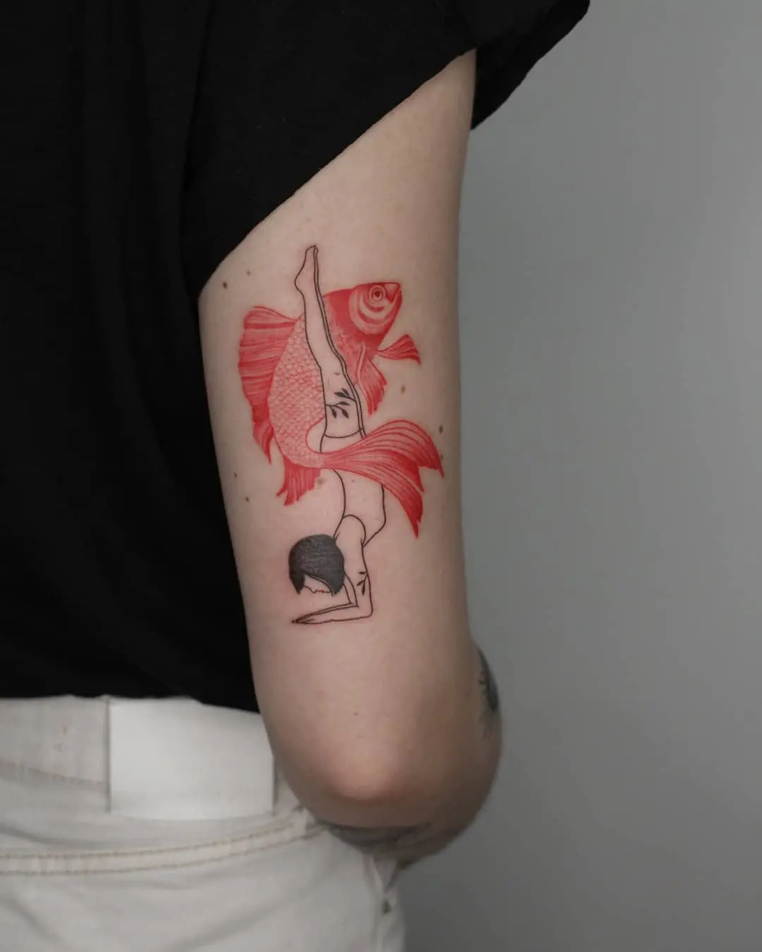 Expressive yoga tattoo blending grace and nature