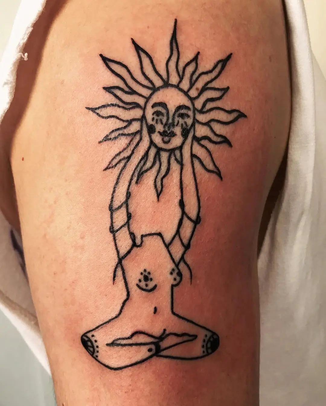 Sun-Inspired Yoga Tattoo for Serenity