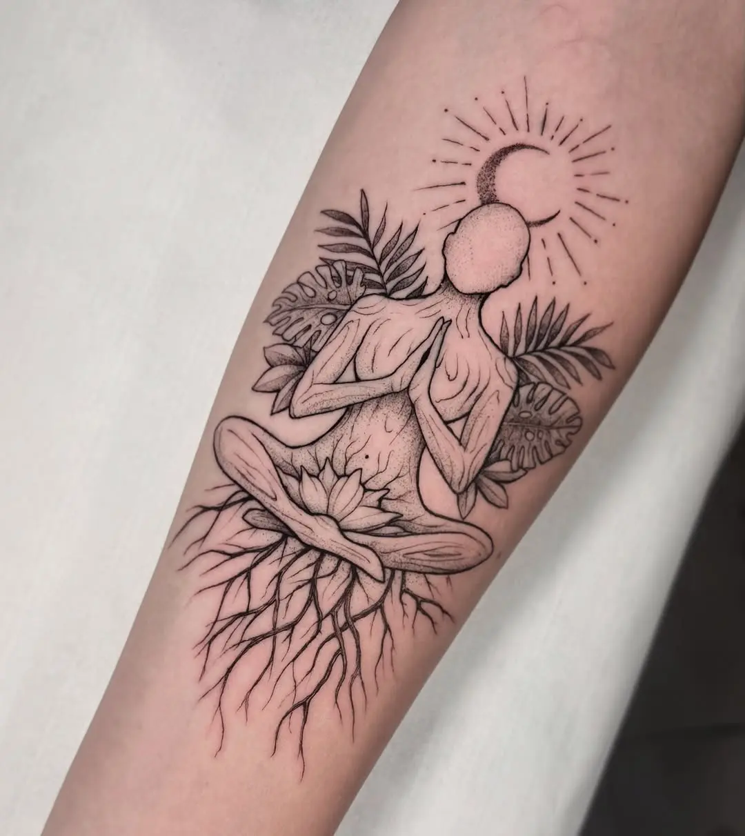 Serene meditation tattoos with natural elements