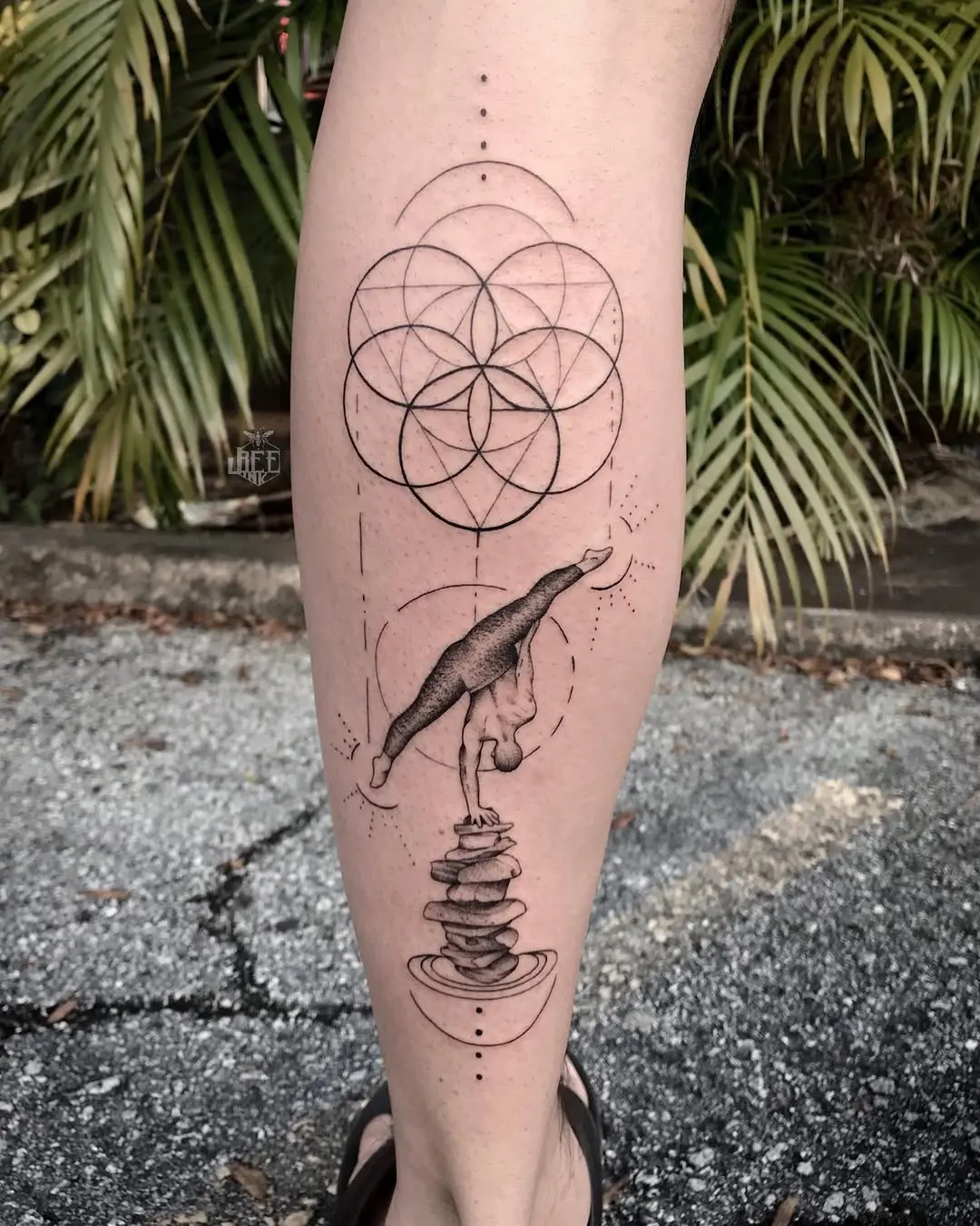 Intricate yoga tattoo with geometric patterns