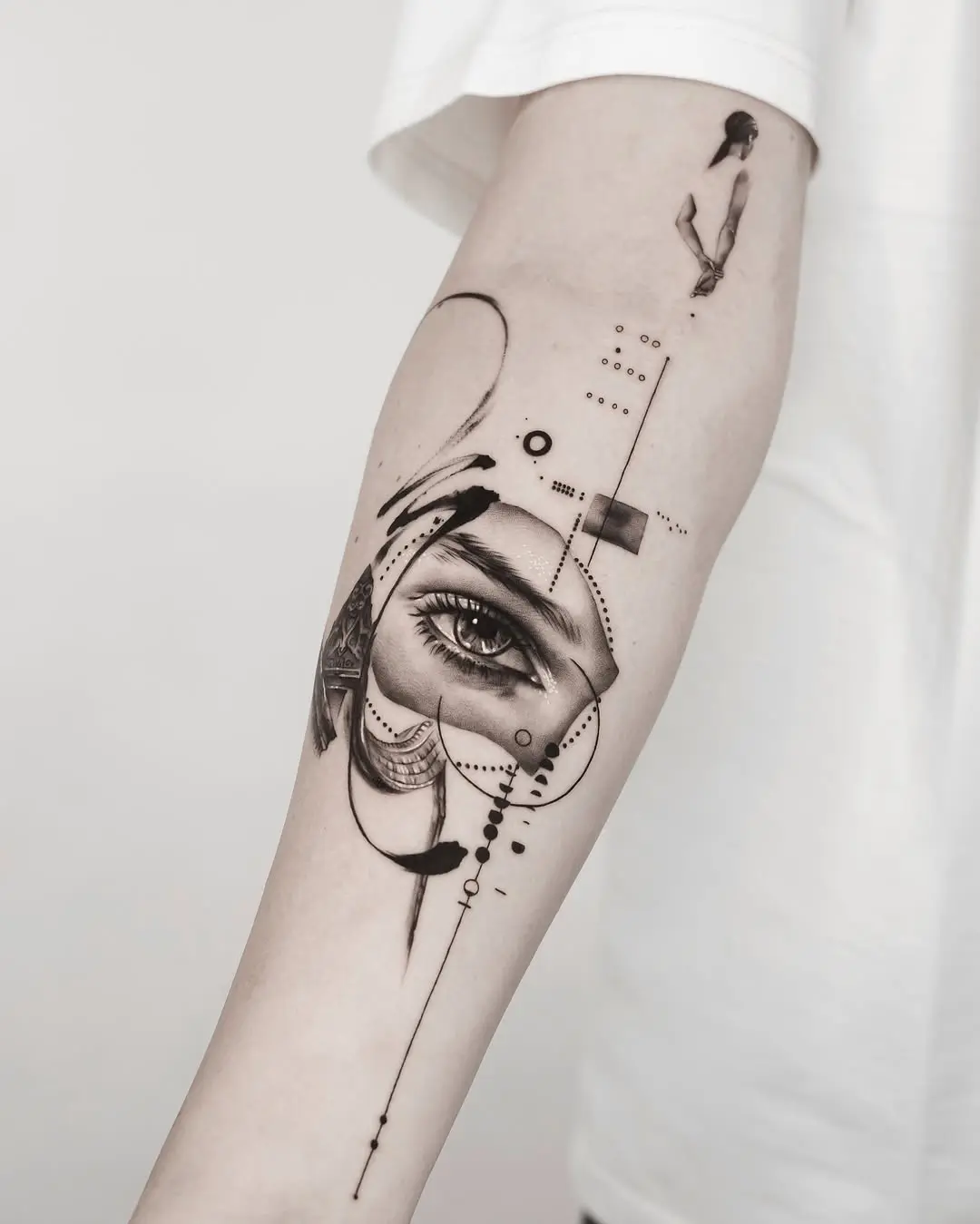 Stunning abstract eye tattoo on the forearm