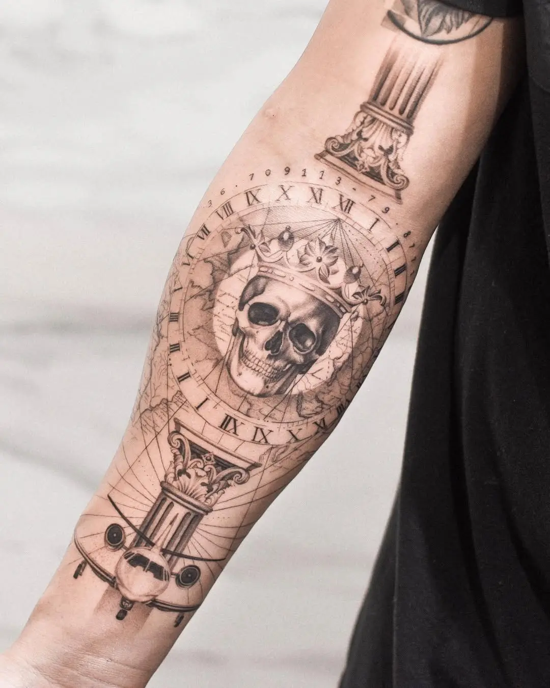 Intricate skull tattoo with airplane elements