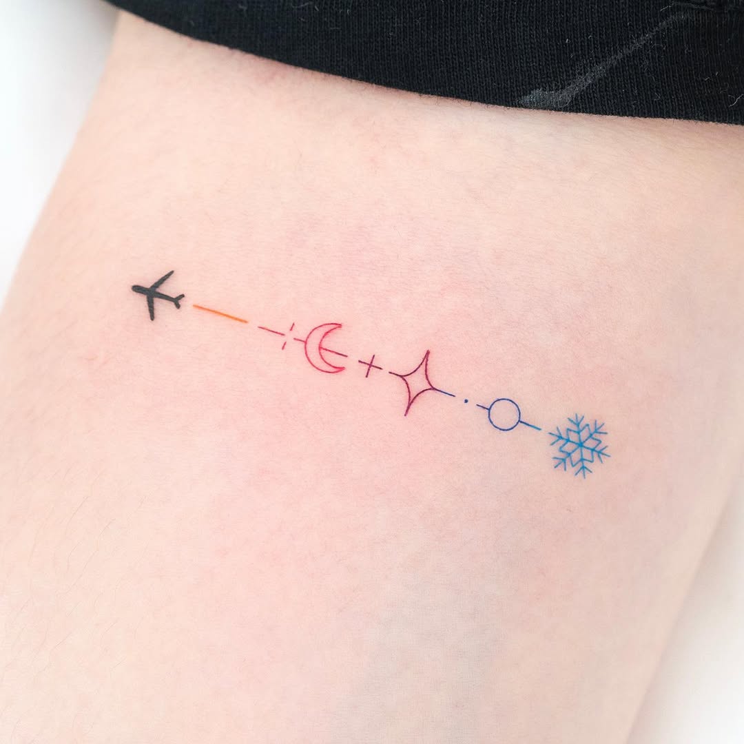 Minimalist Airplane Tattoo with Celestial Elements