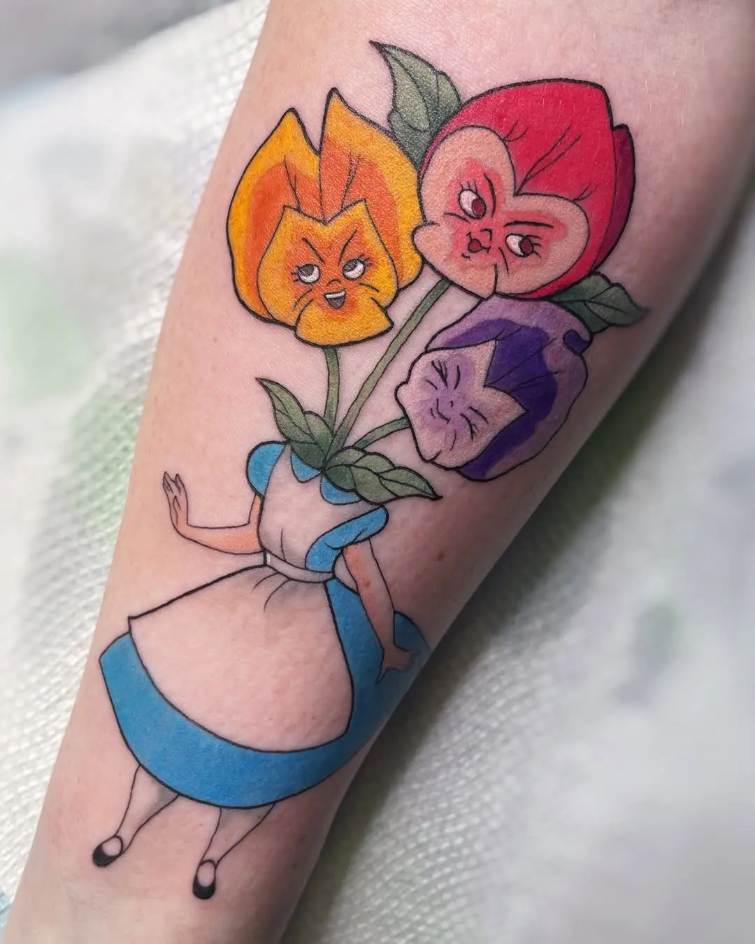 Charming Alice in Wonderland Flower Tattoo Design