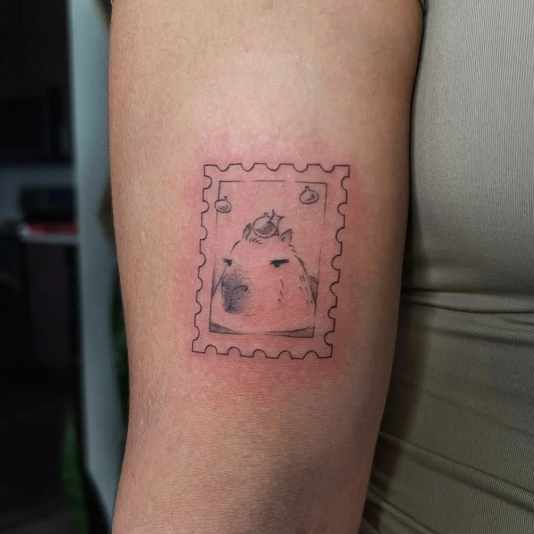 Adorable capybara tattoo in stamp design