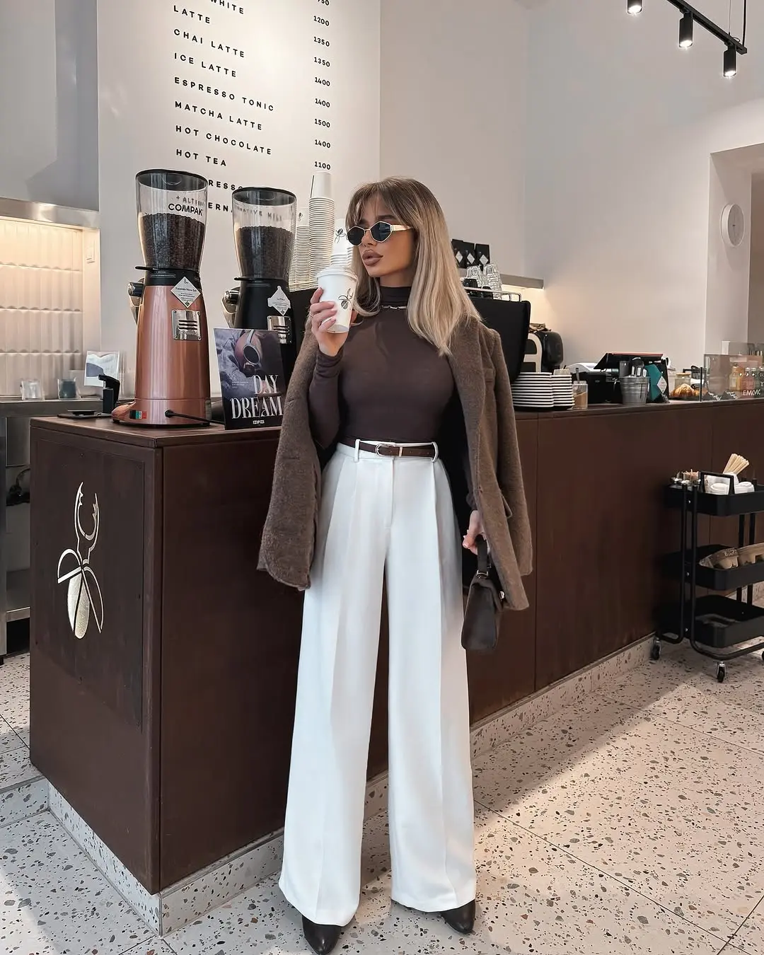 Chic Winter Outfit with White Pants and Brown Top