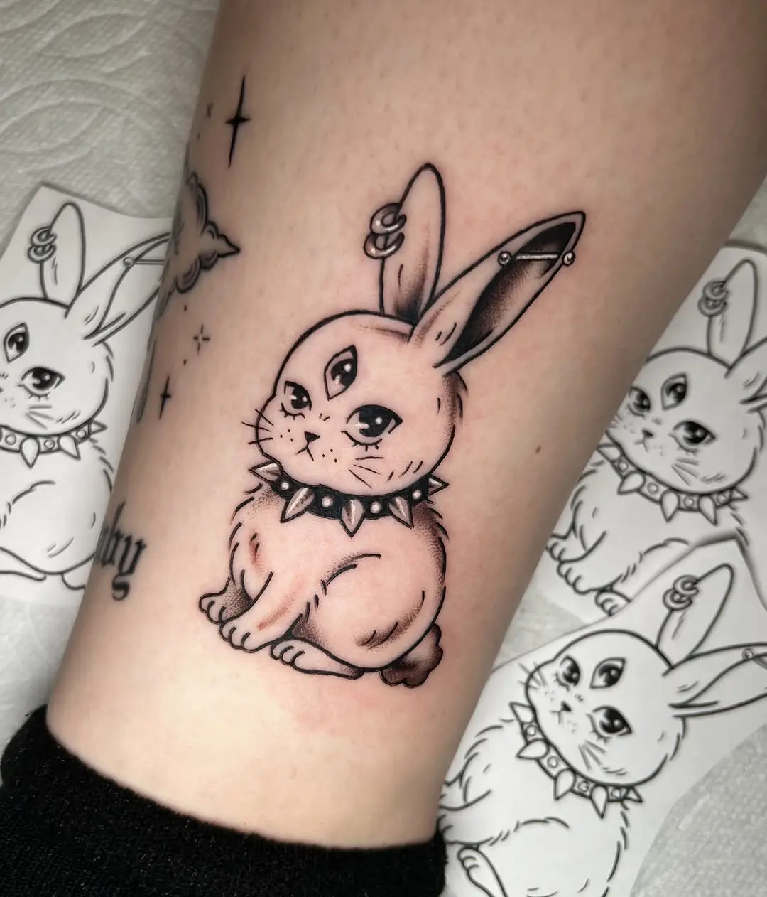 Adorable bunny tattoo with unique charm