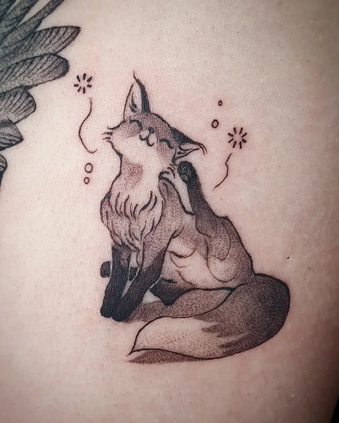 Charming fox tattoo radiating pure joy