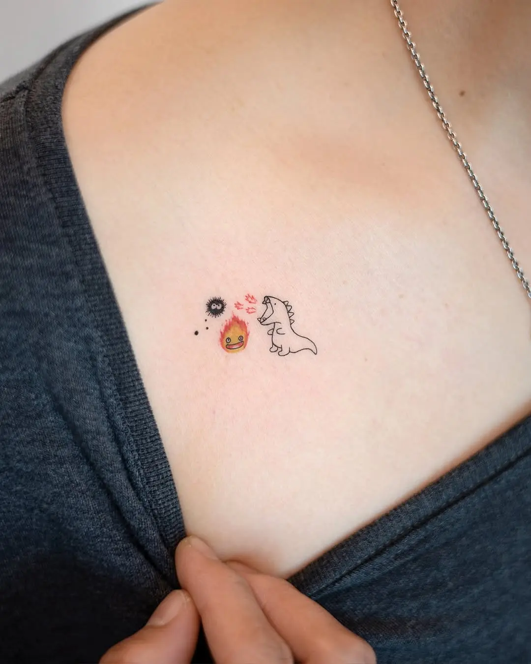 Charming unicorn tattoo with playful fire scene