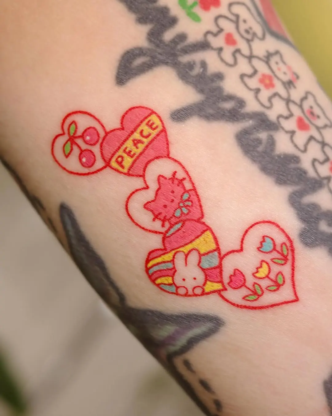 Adorable hearts featuring cherry and peace symbols