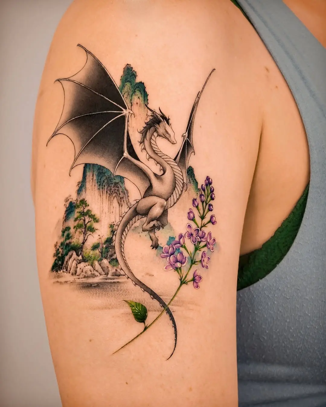 Elegant Dragon Tattoo with Floral Accents
