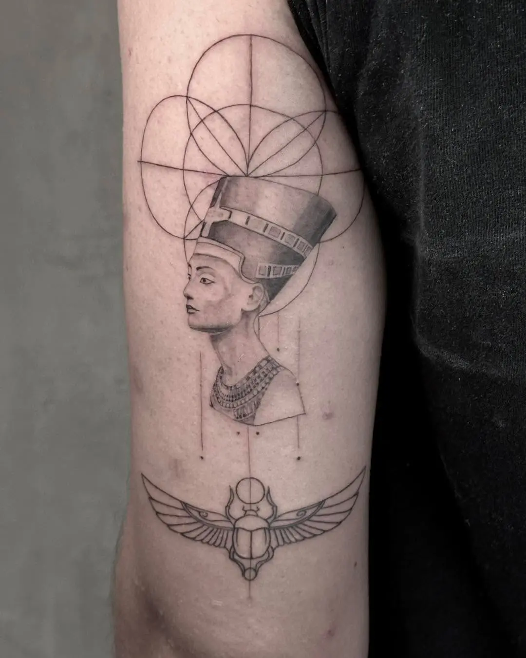 Intricate Egyptian tattoo showcasing Nefertiti's elegance