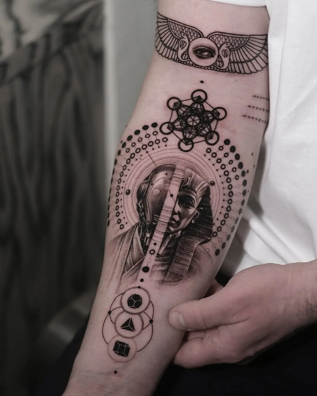 Intricate Egyptian tattoo blending tradition and modernity