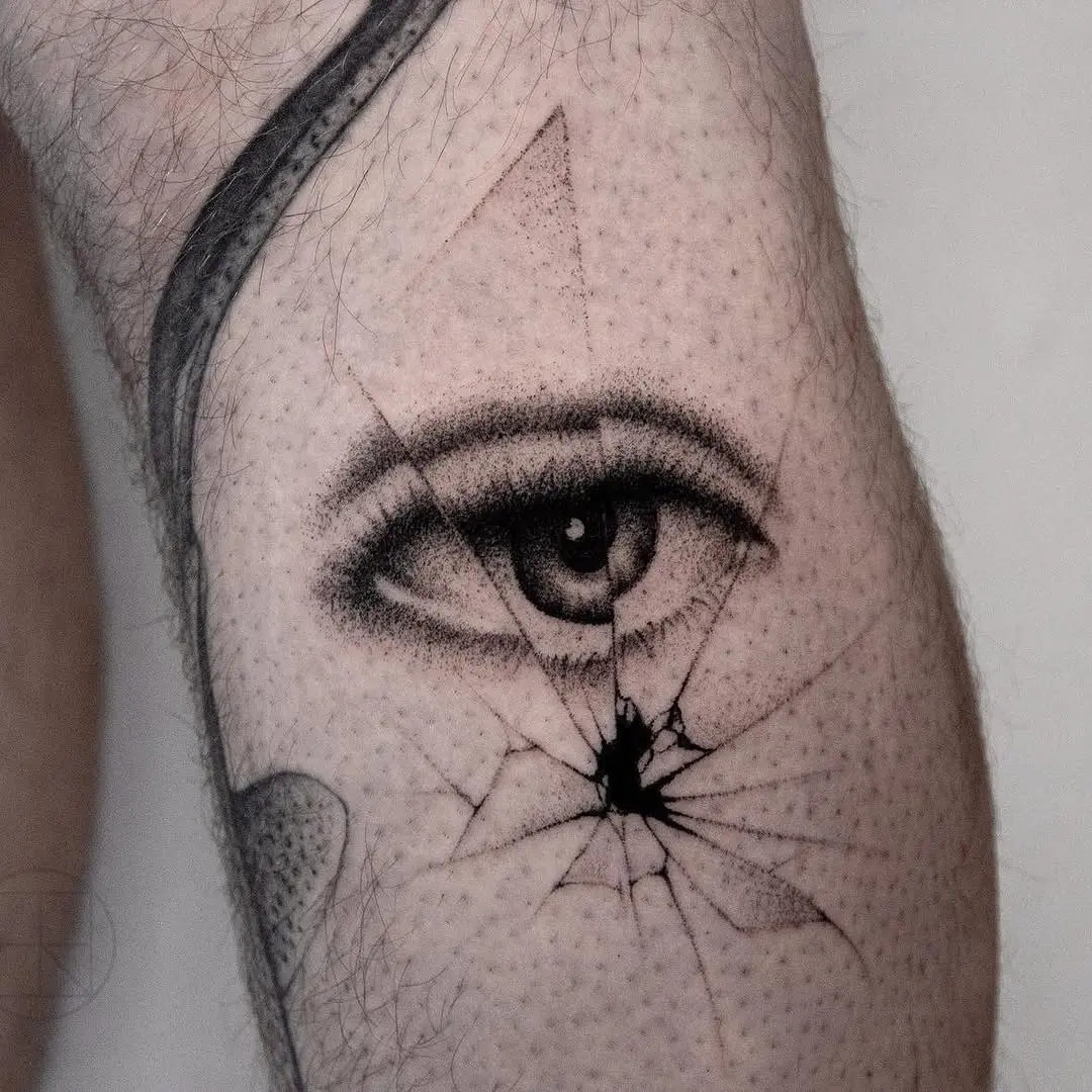 Intriguing cracked eye tattoo design