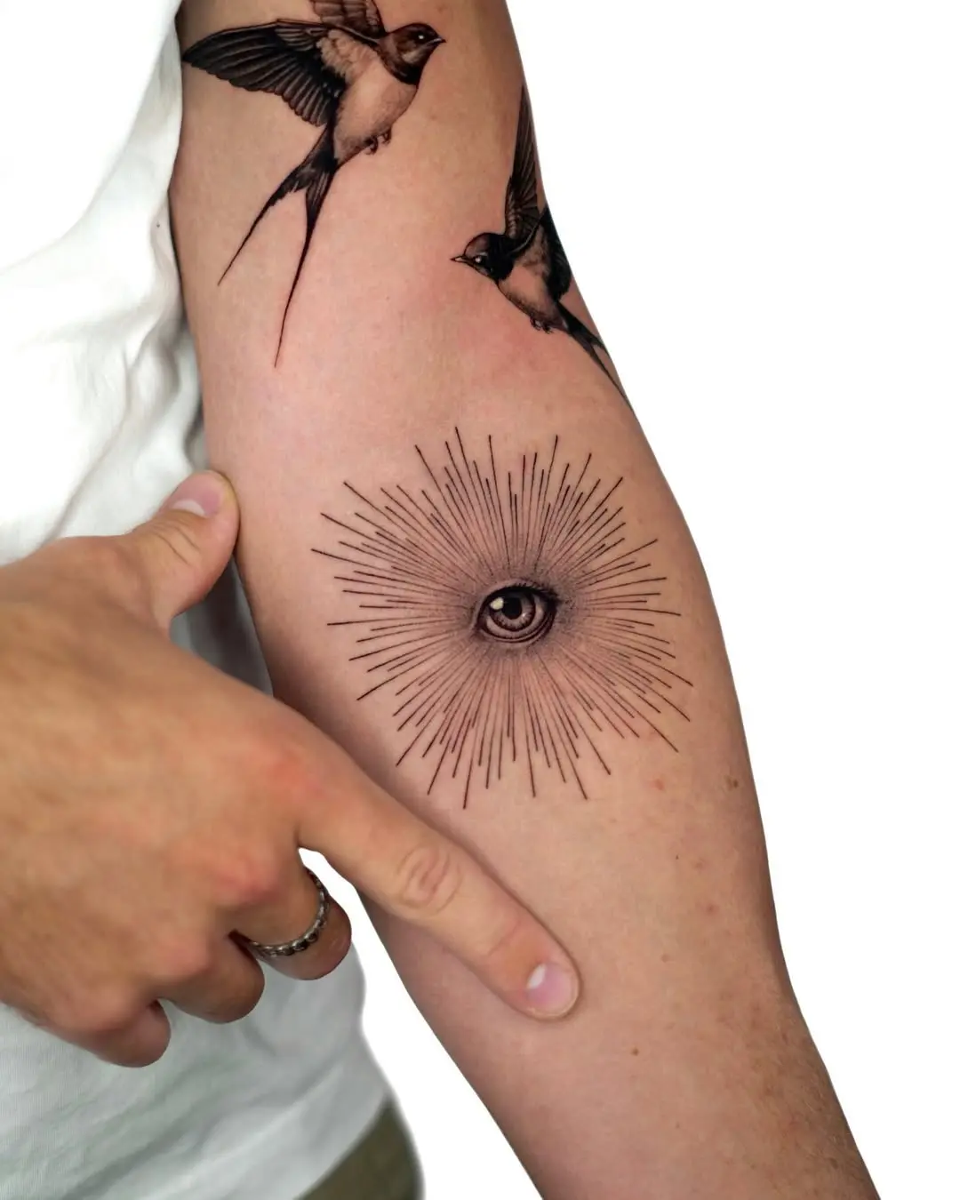 Striking eye tattoo radiating artistic energy