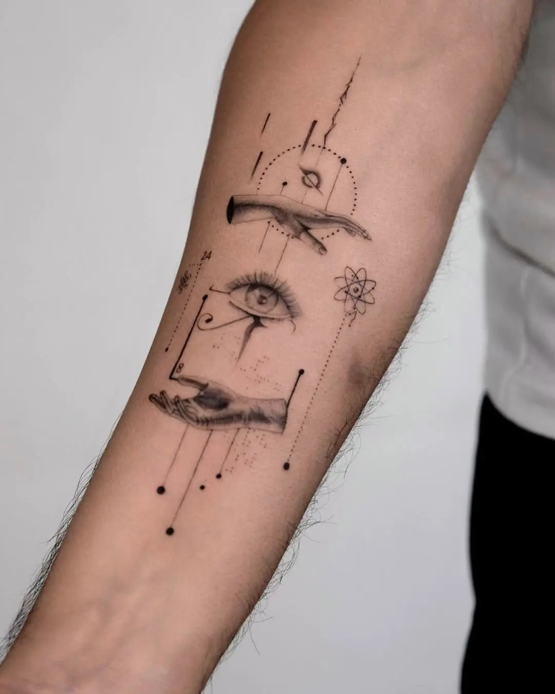 Intricate tattoo blending eyes and hands imagery