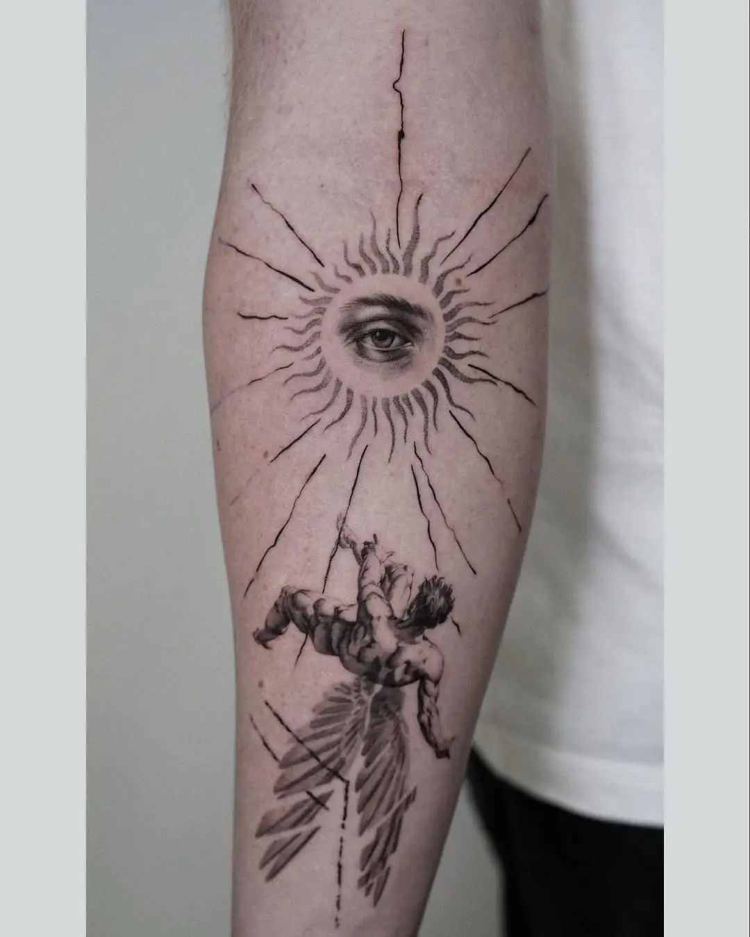 Intricate eye tattoo with celestial elements
