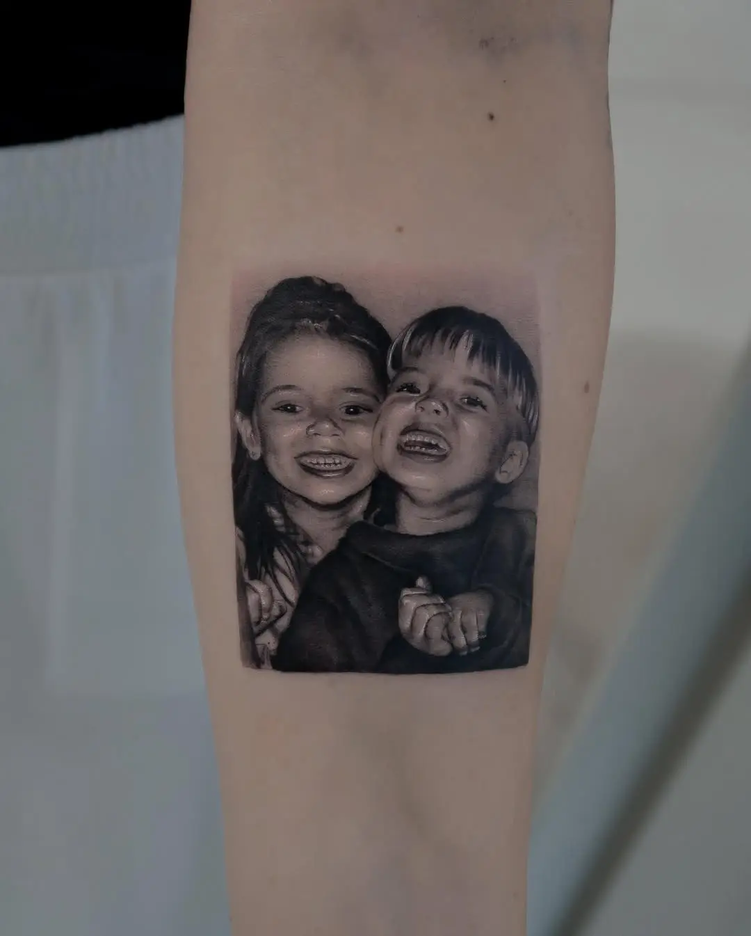 Emotive Portrait of Siblings Captured in Ink