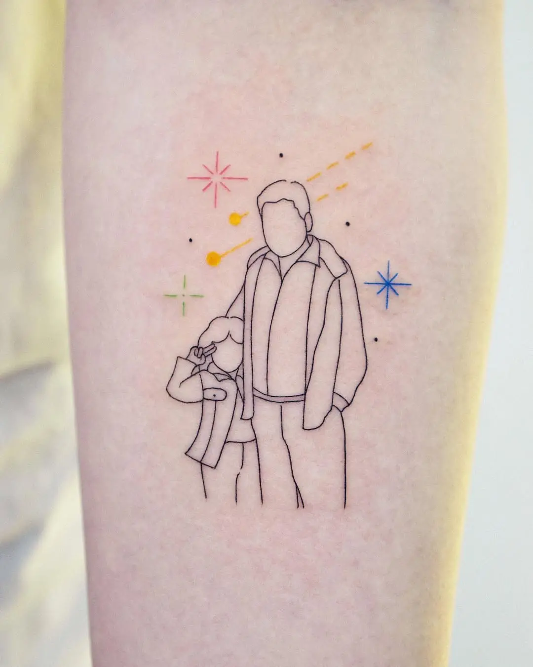 Elegant father-daughter outline tattoo design