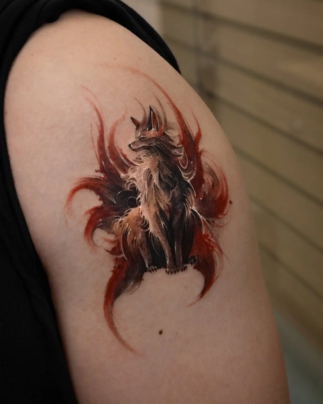 Artistic fox tattoo with vibrant colors and flair