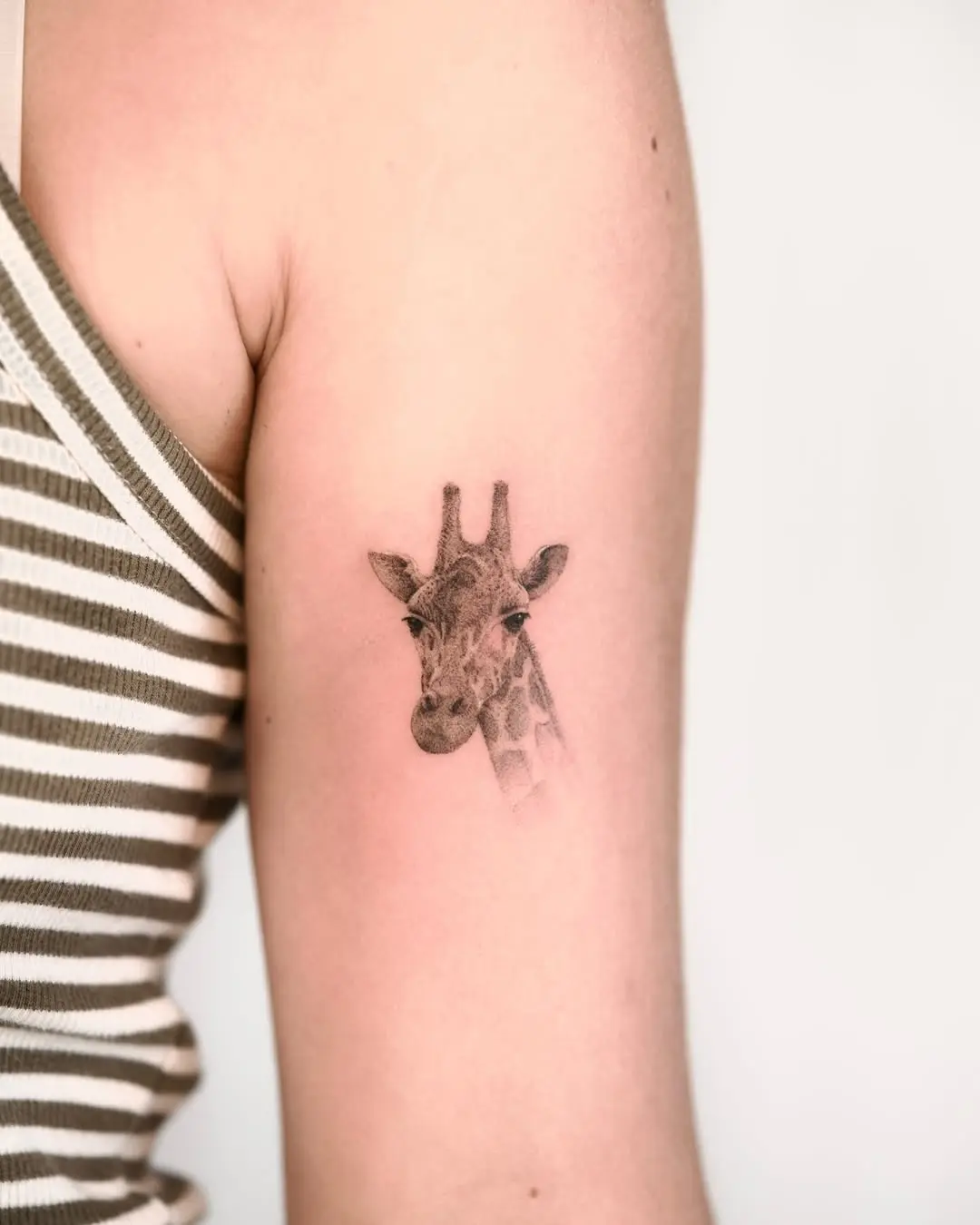 Stylish Giraffe Tattoo with Realistic Detail