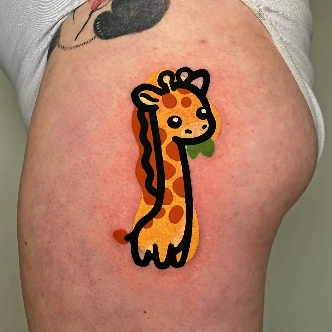 Playful giraffe tattoo radiates cheerful vibes