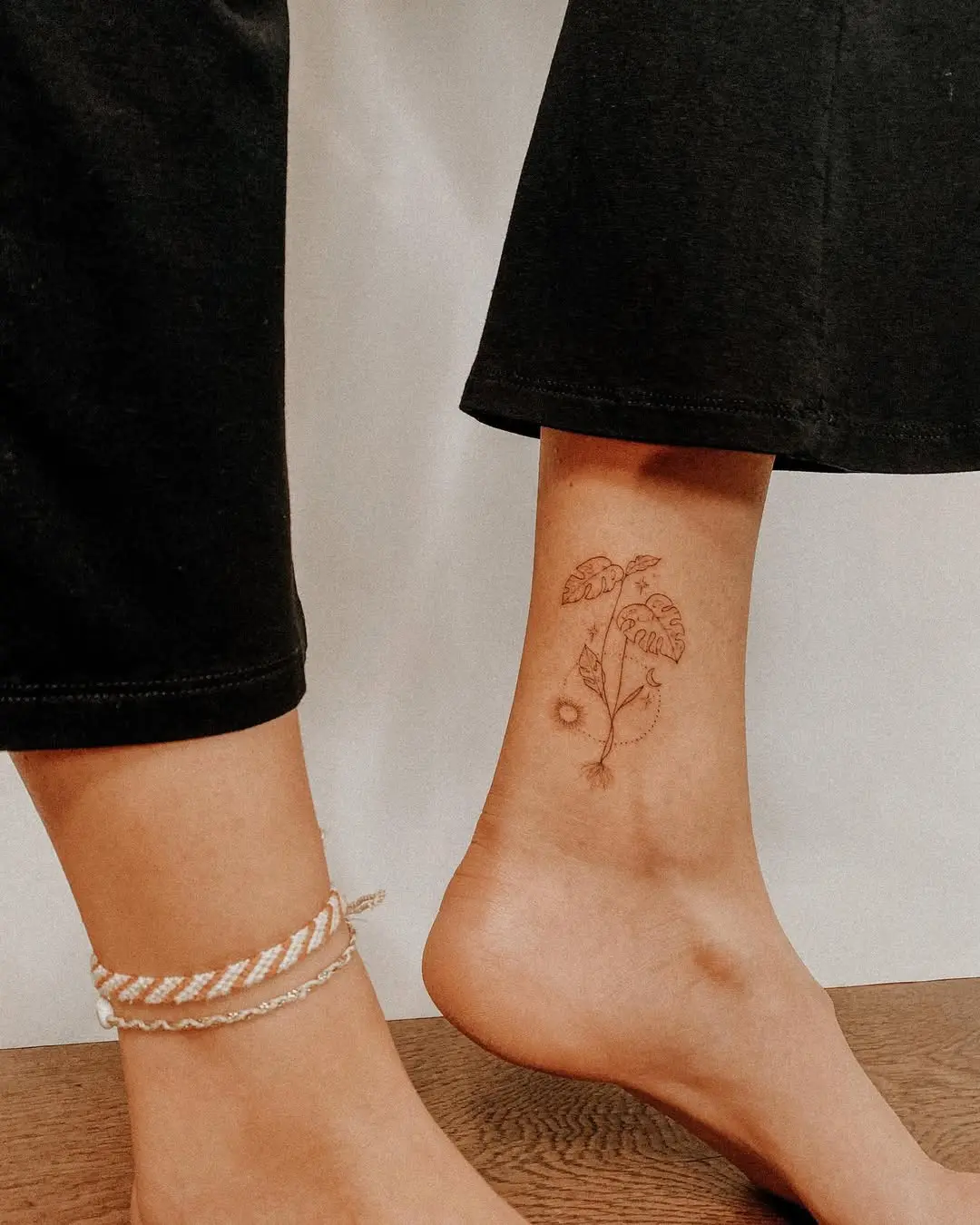 Delicate floral tattoo symbolizing personal growth