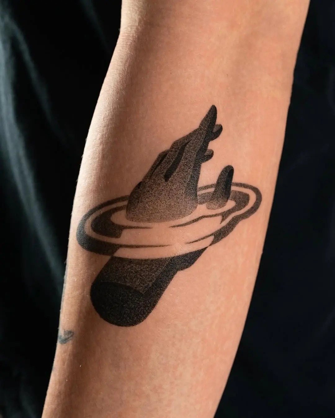 Symbolic hand tattoo inspired by growth imagery