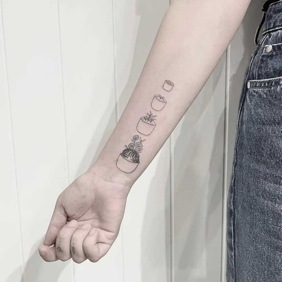 Charming potted plant tattoos for growth lovers