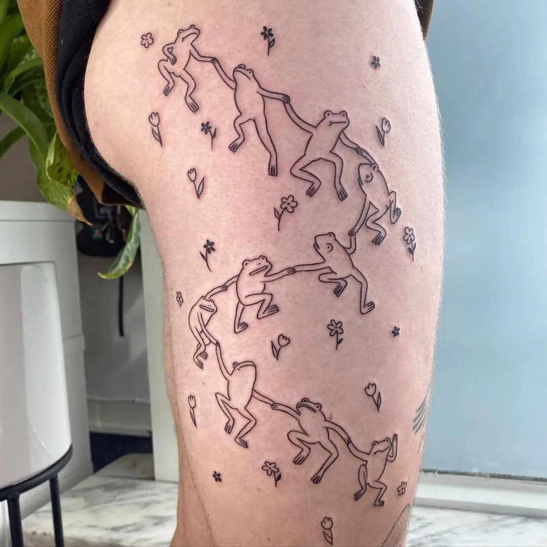 Frogs happily dancing in a line tattoo