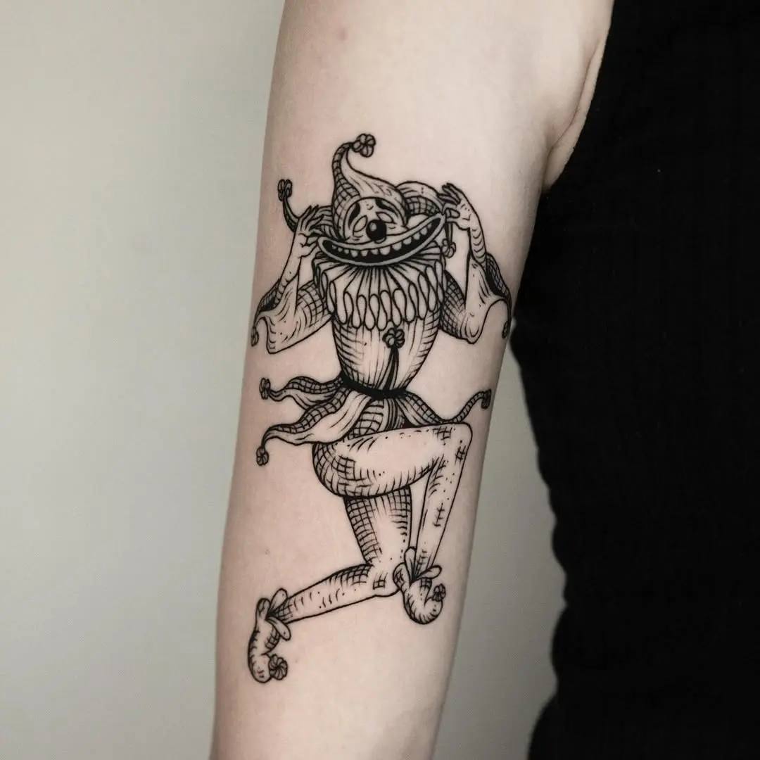 Cheerful jester tattoo exuding playful vibes