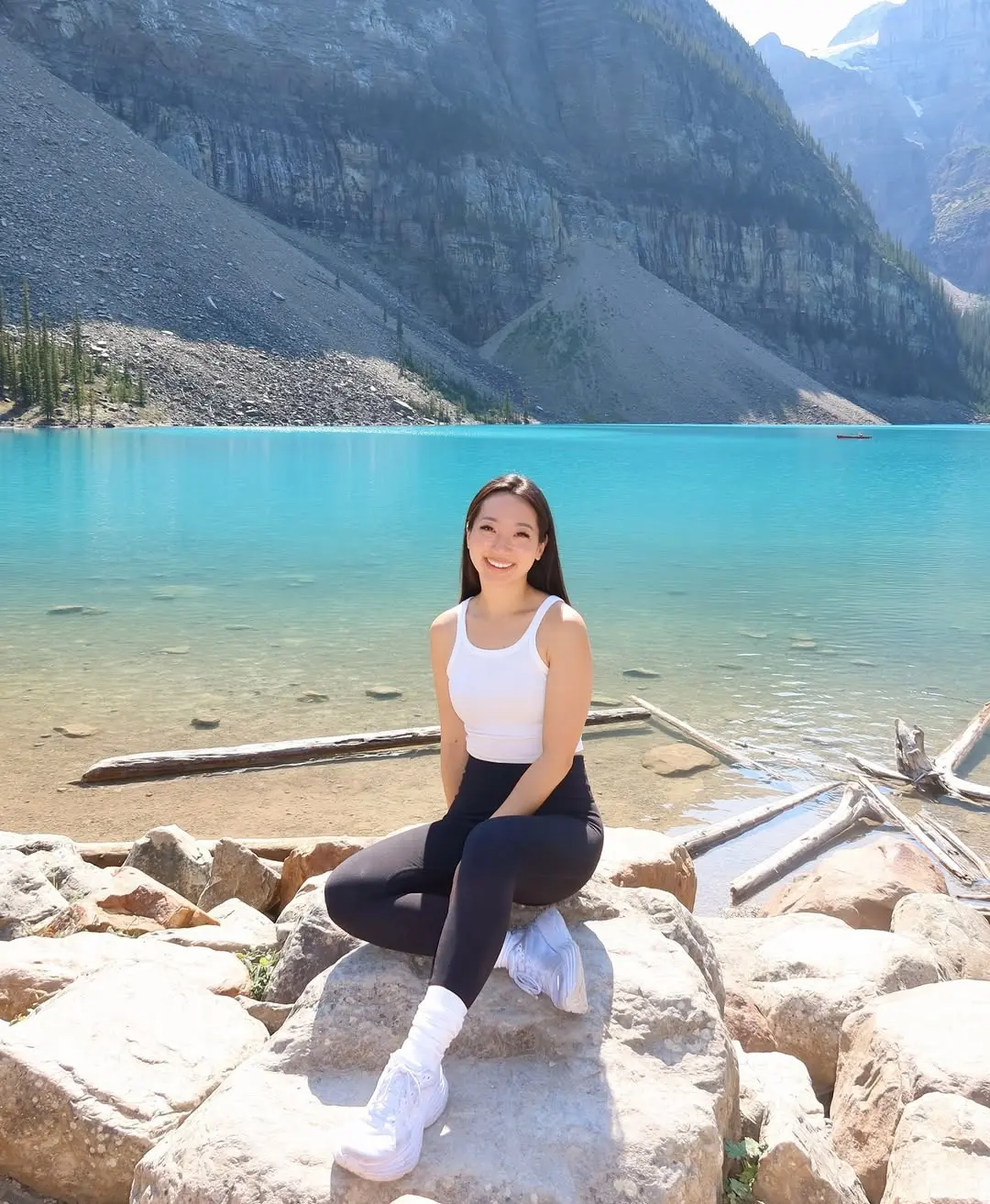 Chic leggings look by serene lake backdrop