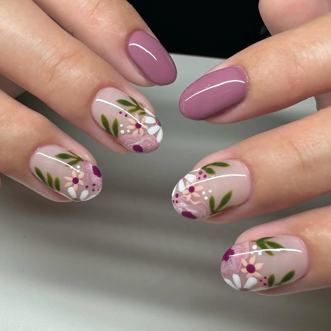 Elegant mauve nails with floral accents