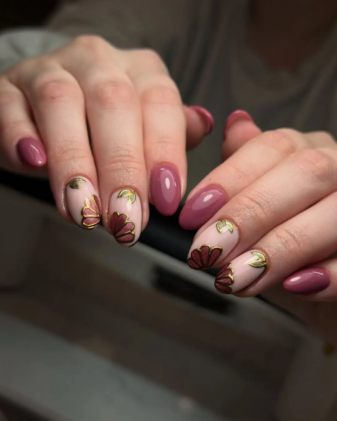 Chic mauve nails with floral accents