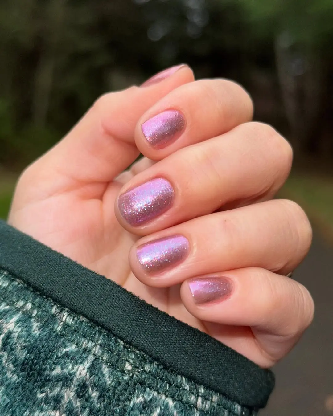 Chic mauve nails with shimmering accents