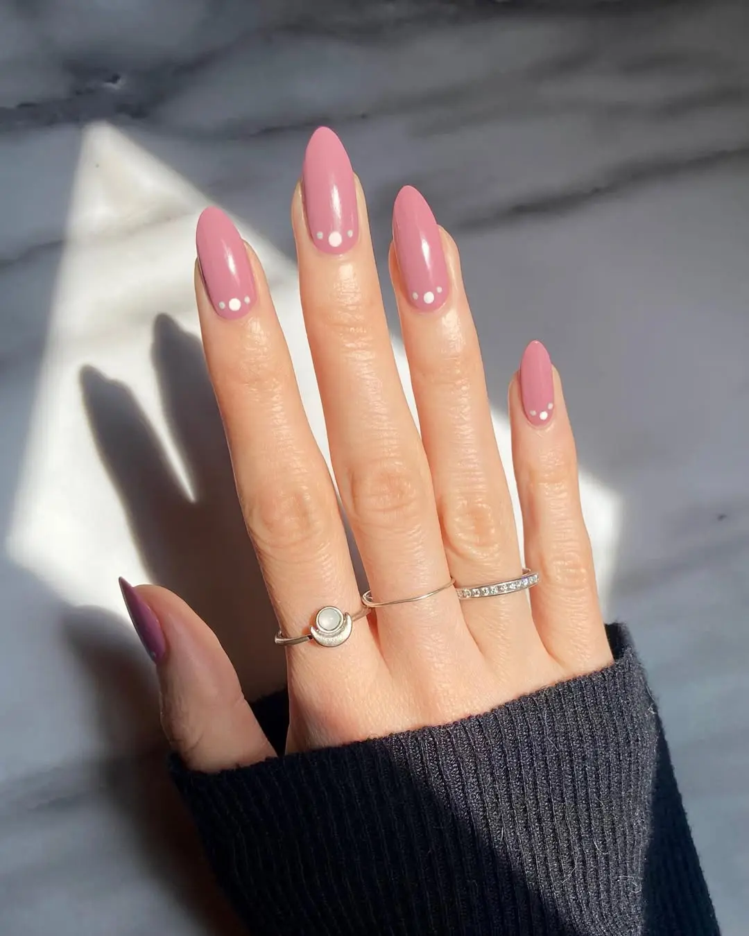 Elegant mauve nails with charming embellishments