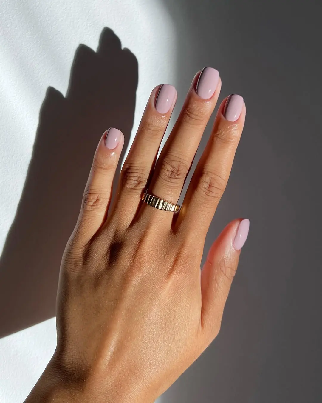 Elegant Mauve Nails with a Chic Touch