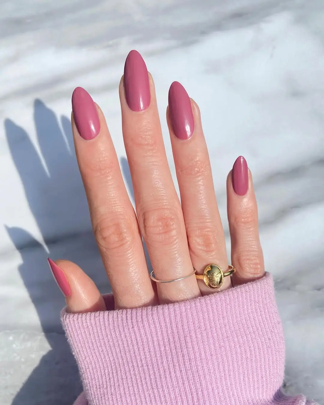 Stylish mauve nails under natural light